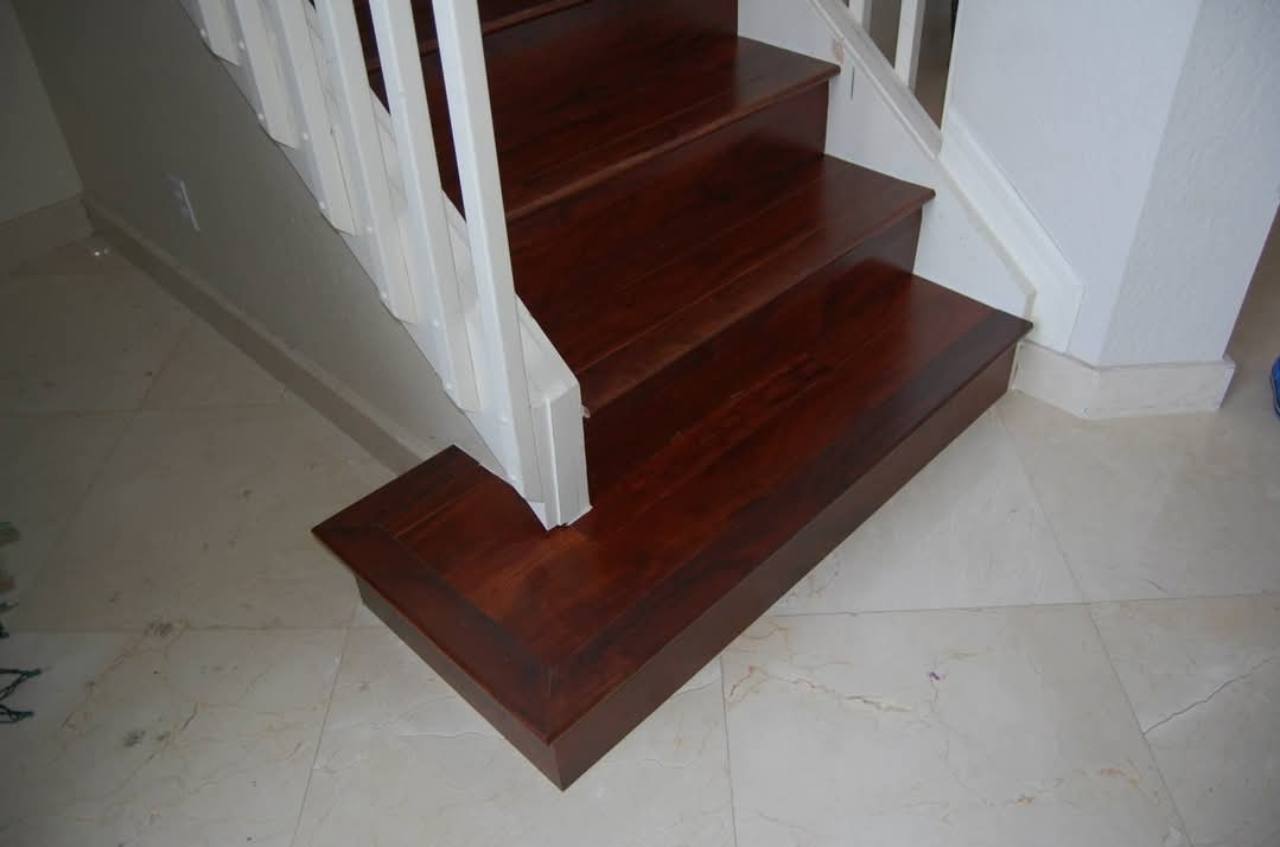Dark stair finish around a broad rectangular base